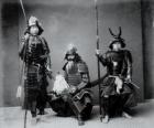 Three authentic samurai warriors, with the armor, the helmet kabuto and armed