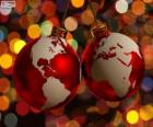 Christmas balls decorated with the world map