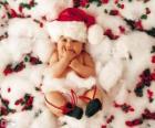 Baby with hat of Santa Claus